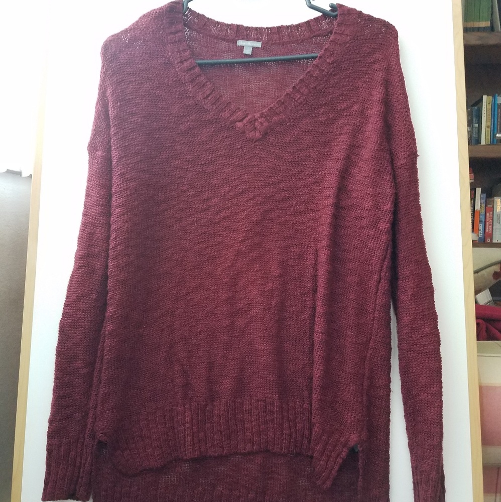 Red V-neck sweater
